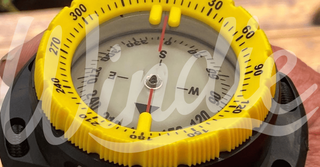 How to Use a Hand Bearing Compass at Sea