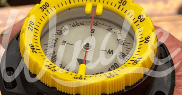 How to Use a Hand Bearing Compass at Sea
