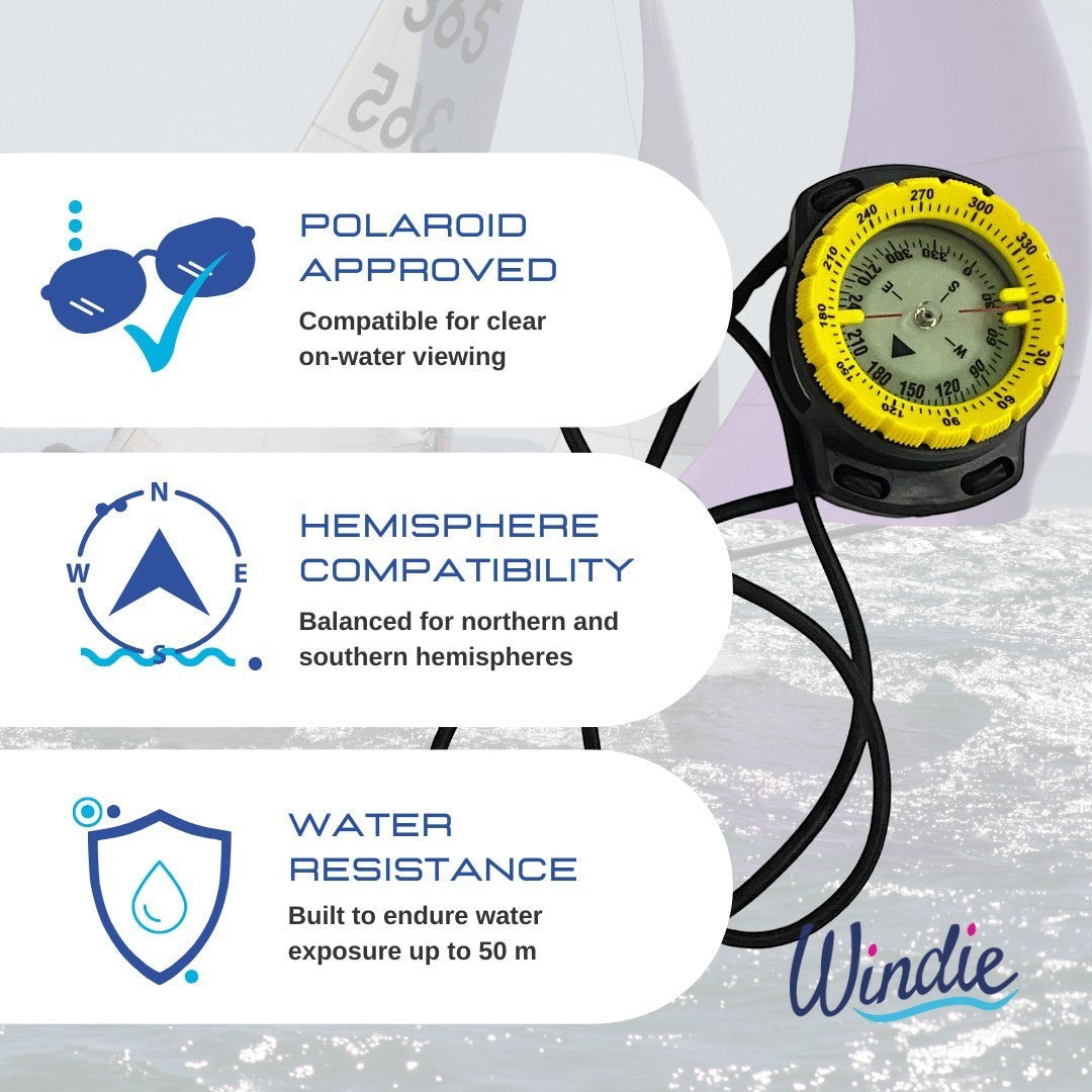 Windie Sailing Precision Trio compass with yellow bezel, black casing, and lanyard. Features Polaroid approved, hemisphere compatibility, and water resistance.