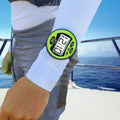 Windie.pro green sailing stopwatch with digital display on arm, showing time and buttons for start, stop, set, sync, mode, and clear.
