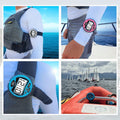 Windie.pro orange sailing race stopwatch timer with 5-4-1-0 countdown, worn on arm with life vest.