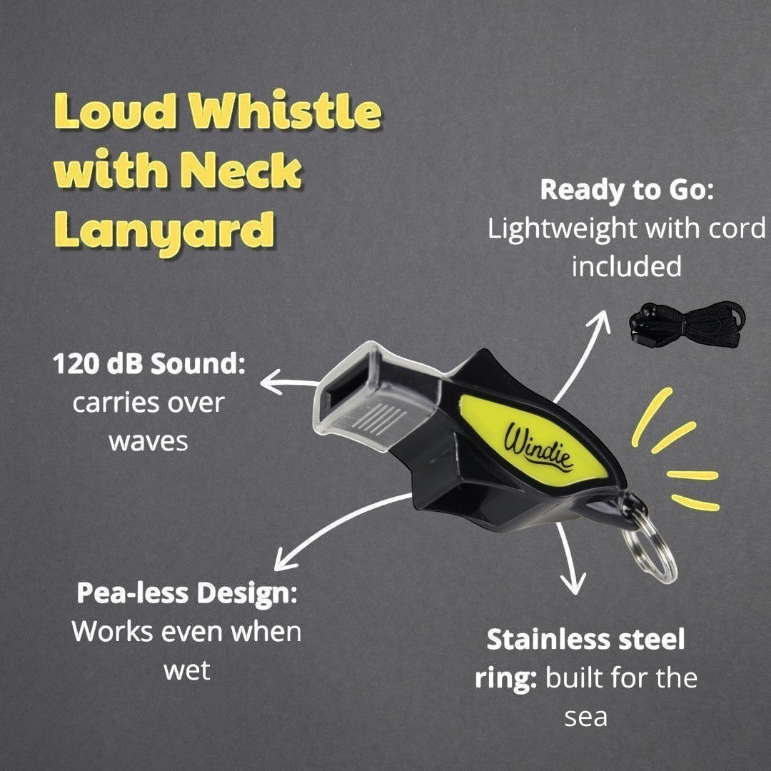 Windie.pro yellow pea-less whistle with rust-resistant metal grip and neck lanyard, used by a man on a boat.