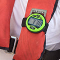 Windie.pro bright green sailing timer stopwatch attached to a red life vest, displaying 3:38.